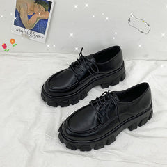 Female black leather shoes